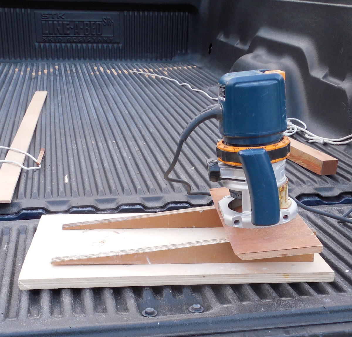 Plywood wedge scarf jig with wedges attached to a base plate. My 